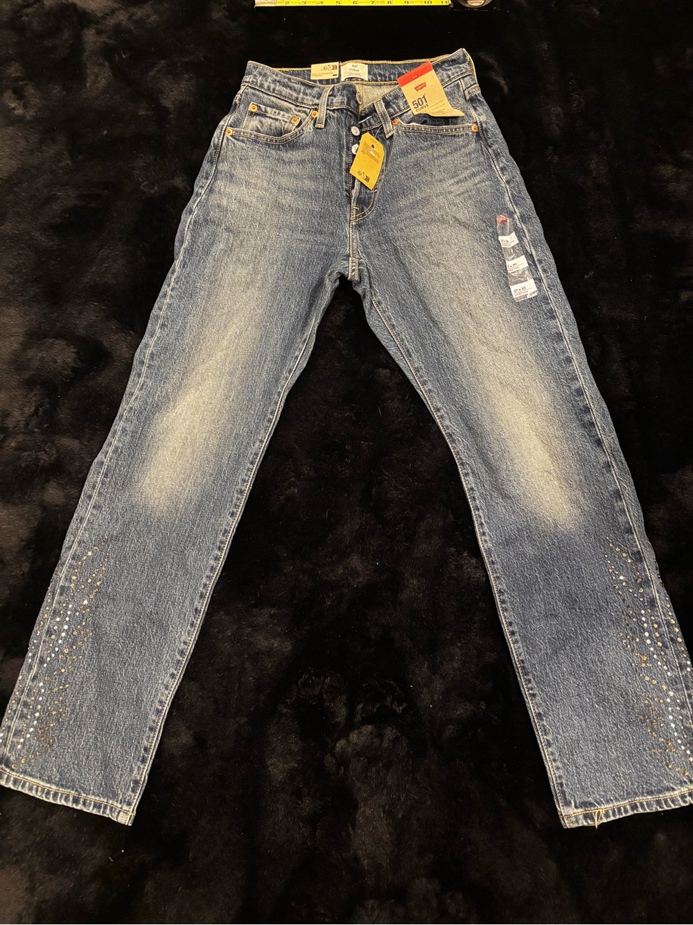 Levi's Men's Straight Jeans in Faded Blue Denim with Stud Accents